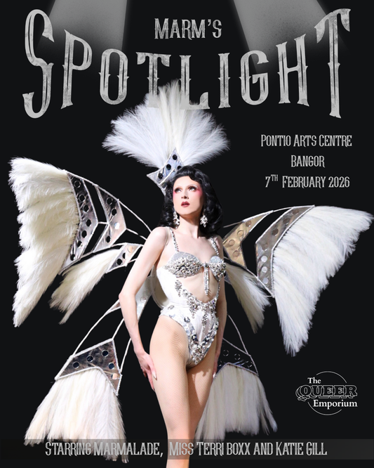 Black background featuring drag artist Marmalade in a showgirl inspired outfit. Above her, there is outline of two light streams, then the name of the event ('Marm's Spotlight'), the date (7th February 2026), the location (Pontio Arts Centre, Bangor) and cast (Marmalade, Miss Terri Boxx and Katie Gill).